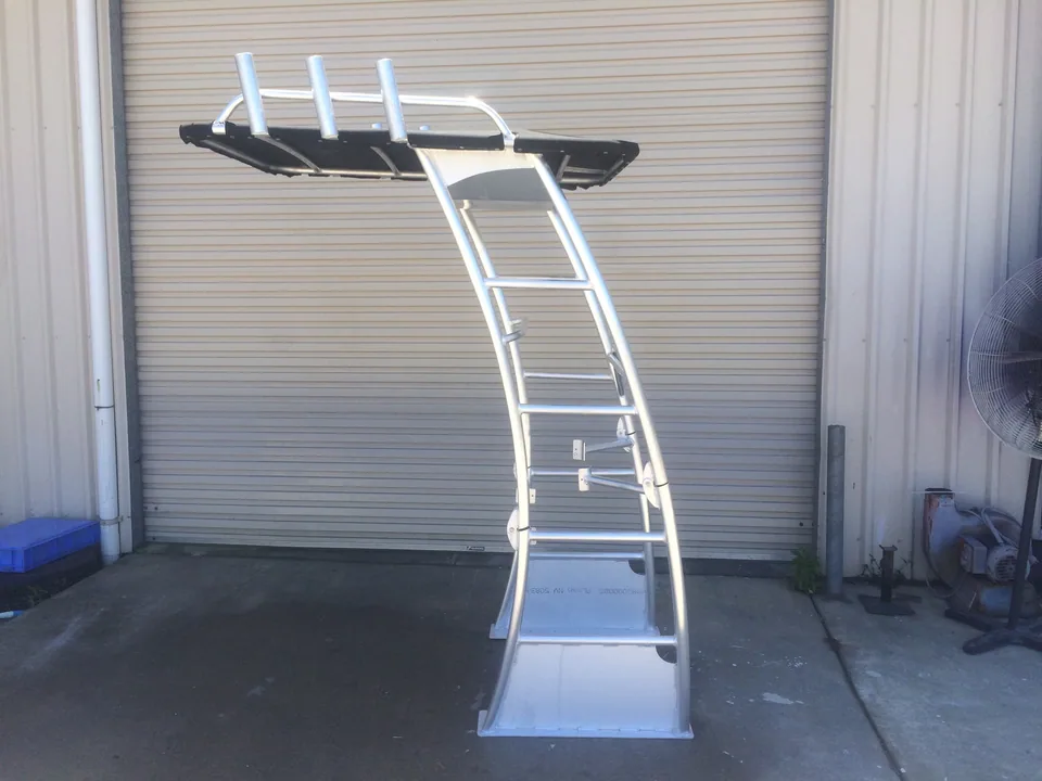 Freestanding curved alloy T-top frame with rod holders along the roof